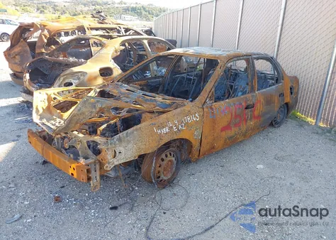 1999 Toyota Corolla Ce из США, поврежденный, VIN 1NXBR12E4XZ178165